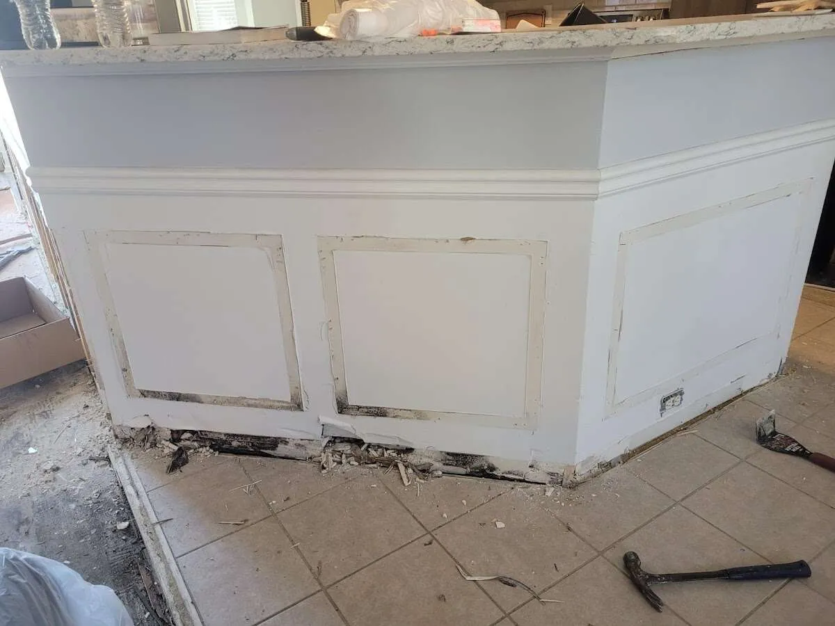 Water damage and mold on kitchen during Storm Damage Restoration in Flatwoods